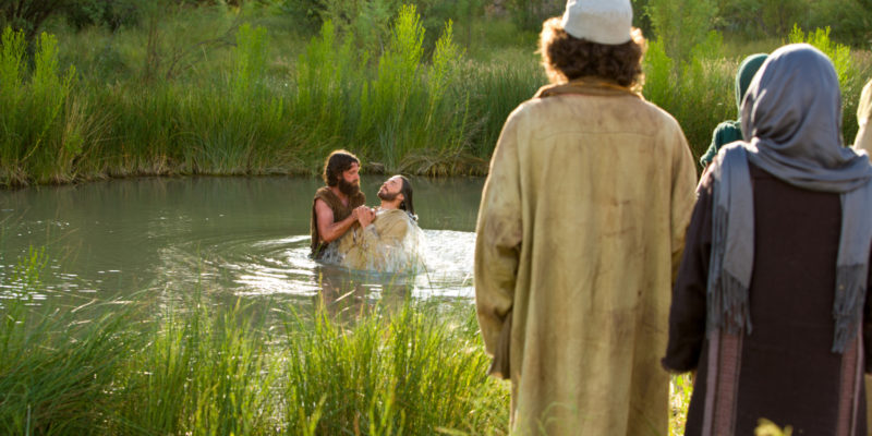 Jesus Baptized in Jordan symbolism going down